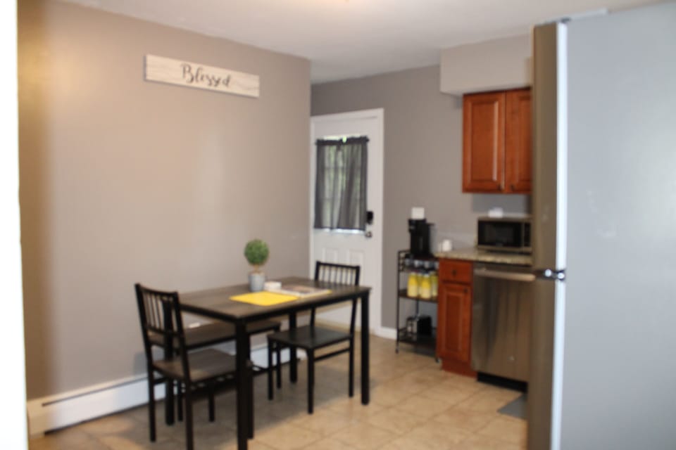 Full kitchen with a coffee area 