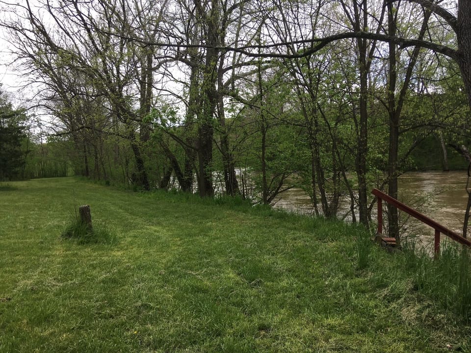 42 acres of wooded trails & 225 feet of river access