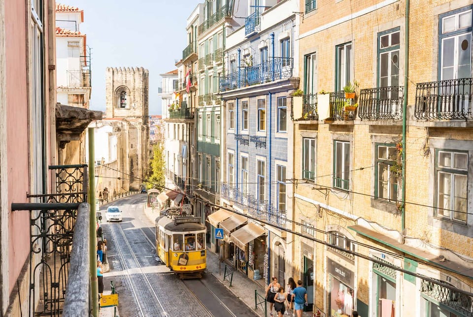 3 Your private postcard view of Lisbon—Sé Cathedral and tram right outside • StayInLisbon