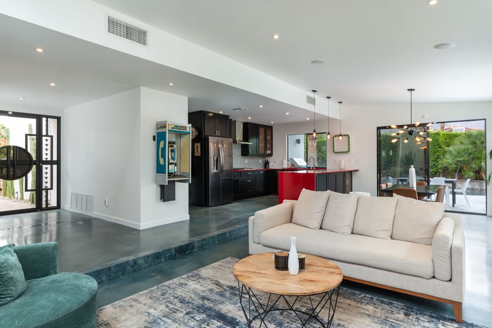 Living room, dining area and kitchen