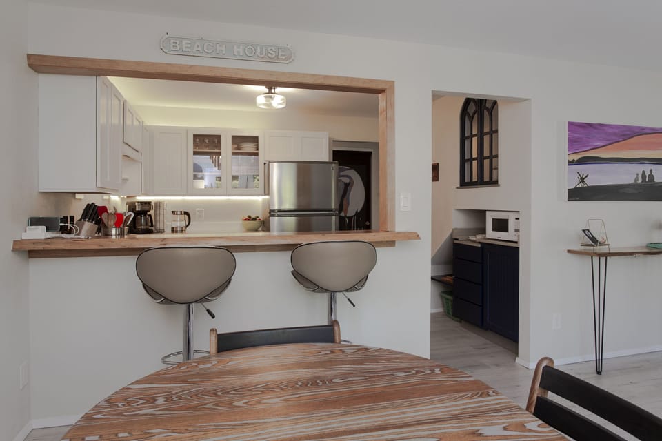 Watch the cook prep meals through the counter bar pass through.