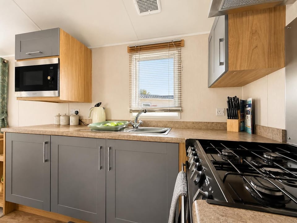 Plan your last-minute family holiday at Parkdean Resorts Southview Holiday Park Skegness, where you can enjoy the comfort of a cosy kitchen area and explore the beauty of Skegness beach England.