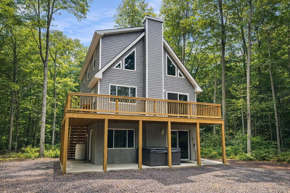 Private chalet embraced by towering trees in a quiet Pocono setting