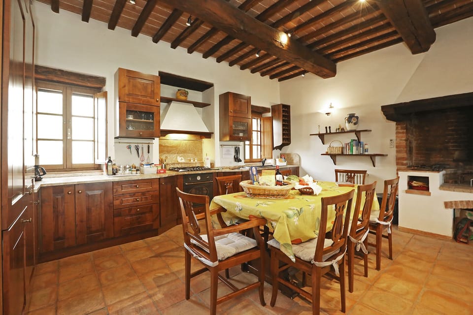 The Dining Table In The Kitchen Expands To Seat 12 