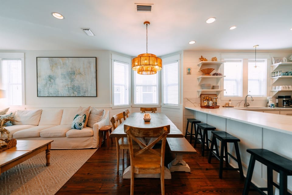 Kitchen and den area connect with plenty of room for your large group