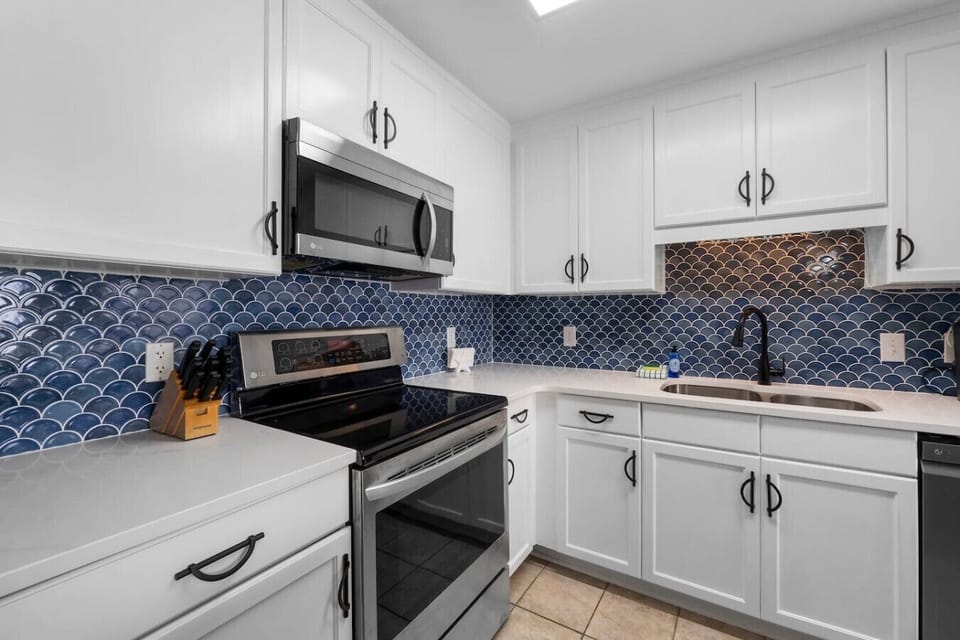 Fully Stocked Kitchen with Ocean Views and Island Bar Seating