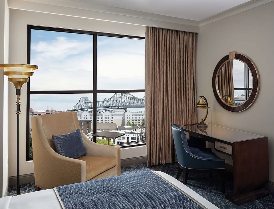 Sip morning coffee by the window with a landmark view.