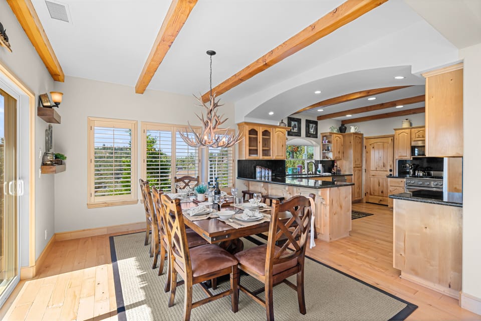 Additional barstool seating at the kitchen counter.