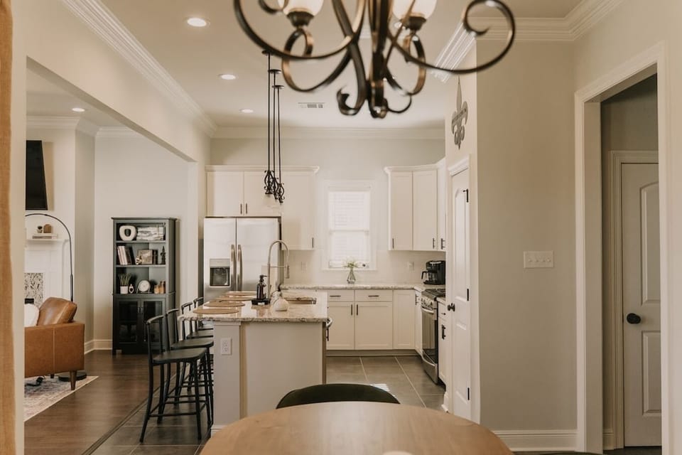 Cook up a storm in the modern, fully-equipped kitchen featuring stainless steel appliances and exquisite countertops.