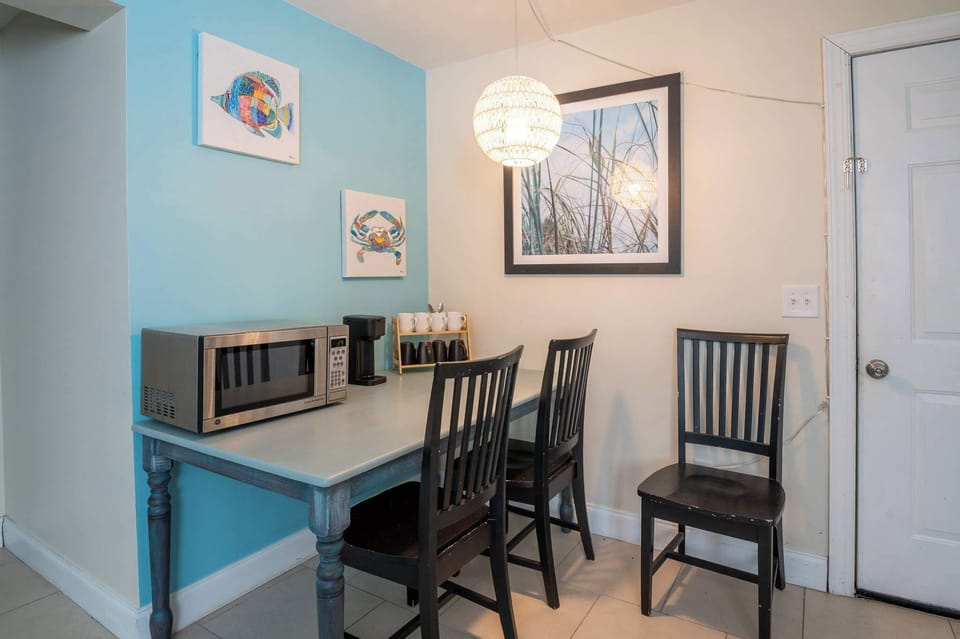Eat-in living room with microwave, coffee bar and mini-fridge