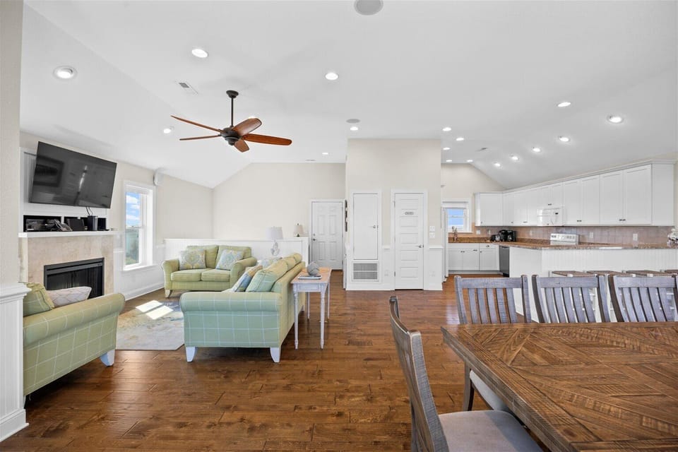Open concept living space - Enjoy the high ceilings throughout the living spaces of this oceanside beauty.