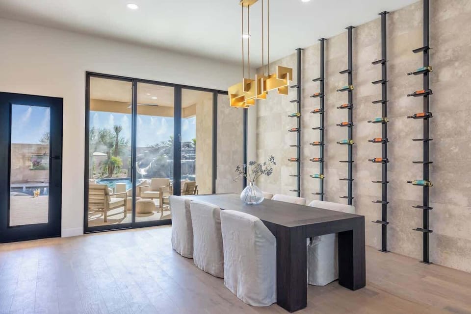 Custom wine display adding style to the open dining space.