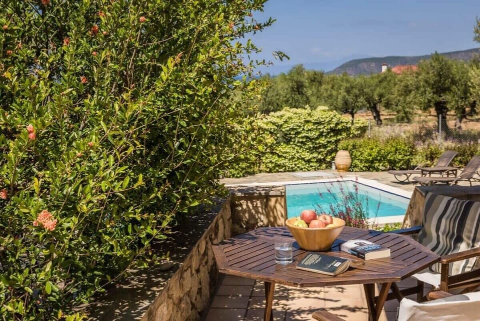 Patio of the Property – Shaded outdoor corner perfect for coffee, dining, or quiet moments in nature.