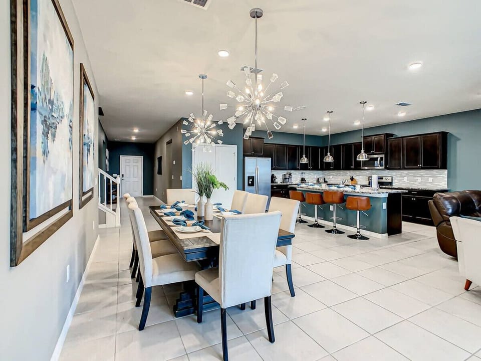 Enjoy the open-concept kitchen and dining area, perfect for cooking, sharing meals, and making memories together.