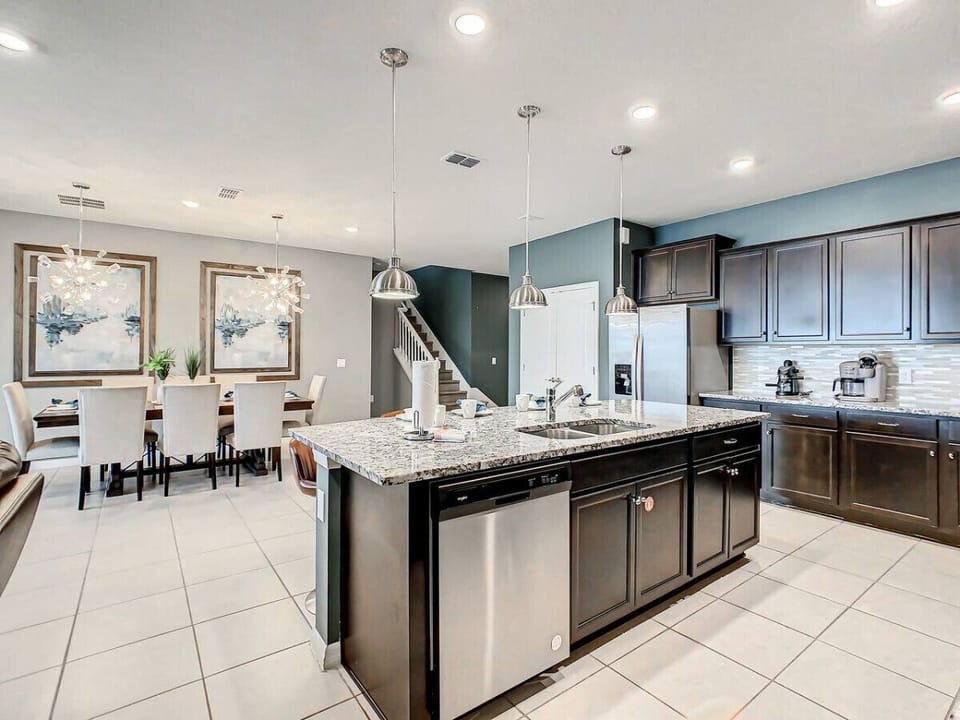 Enjoy the open-concept kitchen and dining area, perfect for cooking, sharing meals, and making memories together.