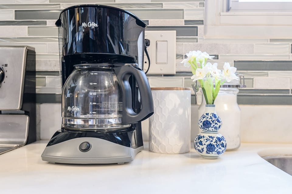 Coffee Maker and Ground Coffee with Creamer and Sugar