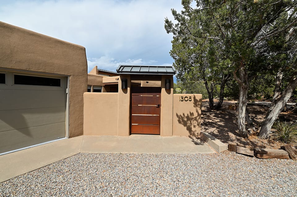 Entrance to home and front courtyard