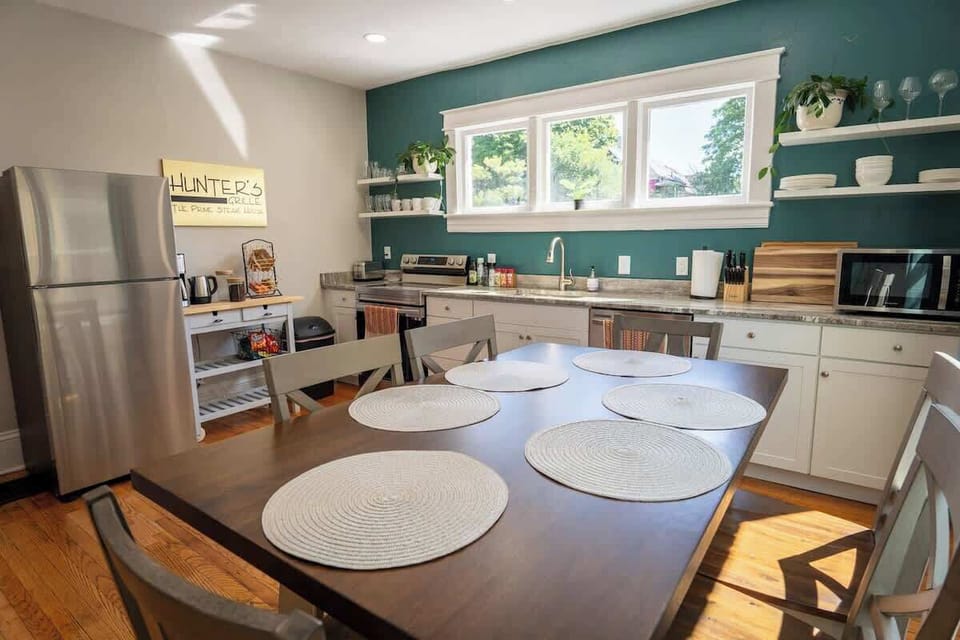 Gather around this exquisite wooden dining table