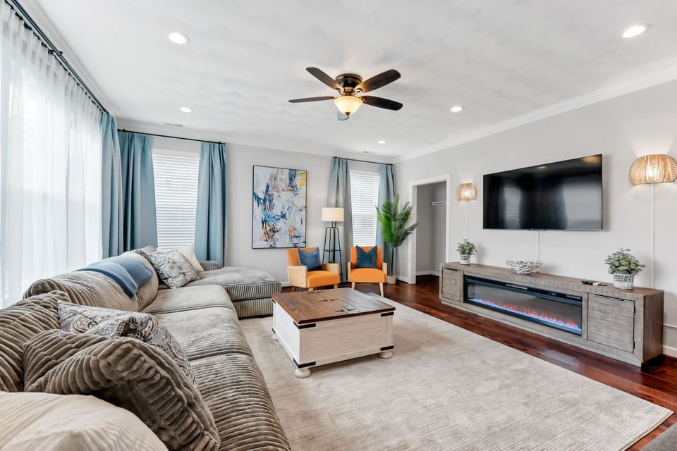 Large comfy living room ready for family movie night with your favorite apps. 