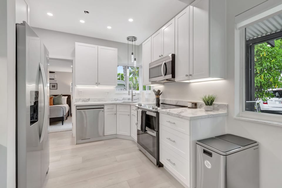 The kitchen is stocked with the essentials for cooking at home, including full-size appliances and plenty of prep space.