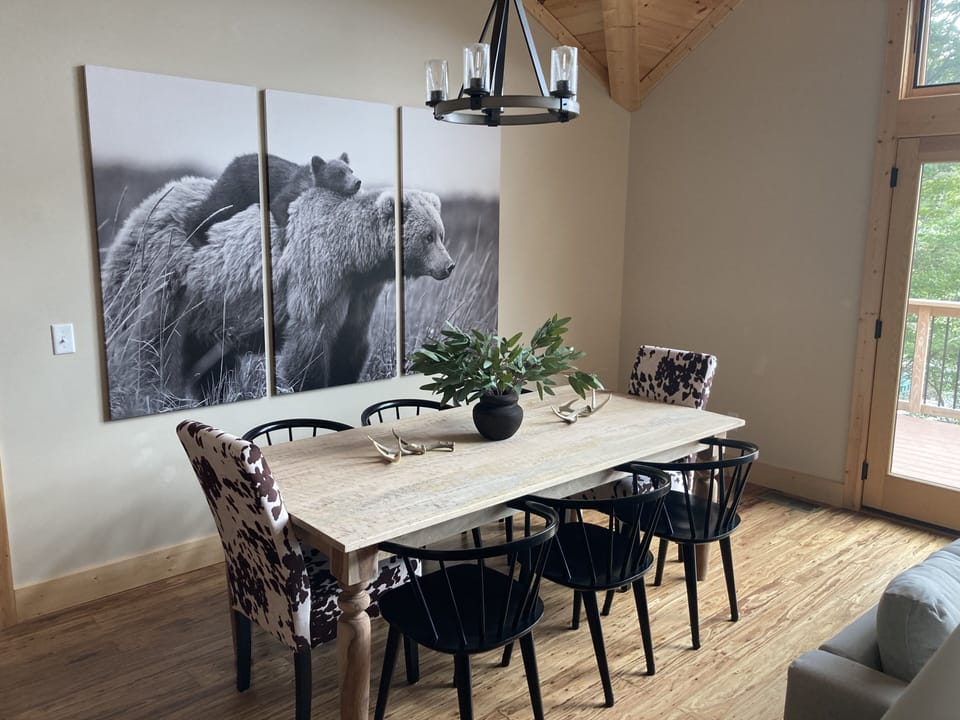 Stylish dining area with rustic charm and comfortable seating for six.