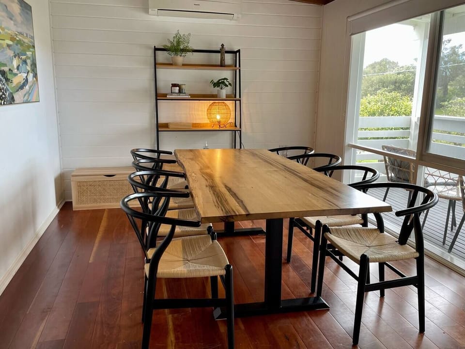 The dining room opens to the verandah creating a beautiful transition with the outdoors.
