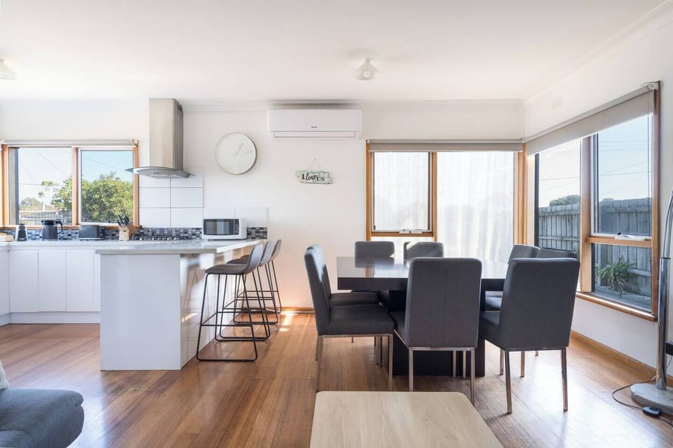 Join together for a meal at home with an eight-seater dining table within the open-plan lounge. 