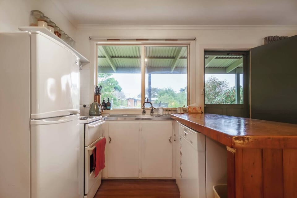  The kitchen includes a fridge, toaster, kettle, espresso machine, dishwasher and other essentials.
 
