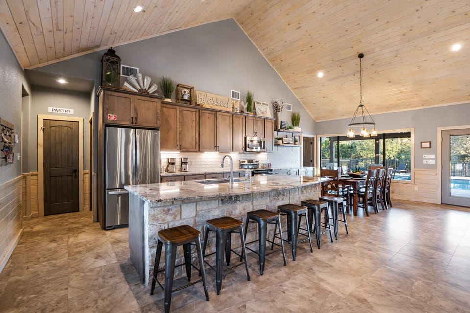 Breakfast bar seating and an over-equipped kitchen that gives you everything.