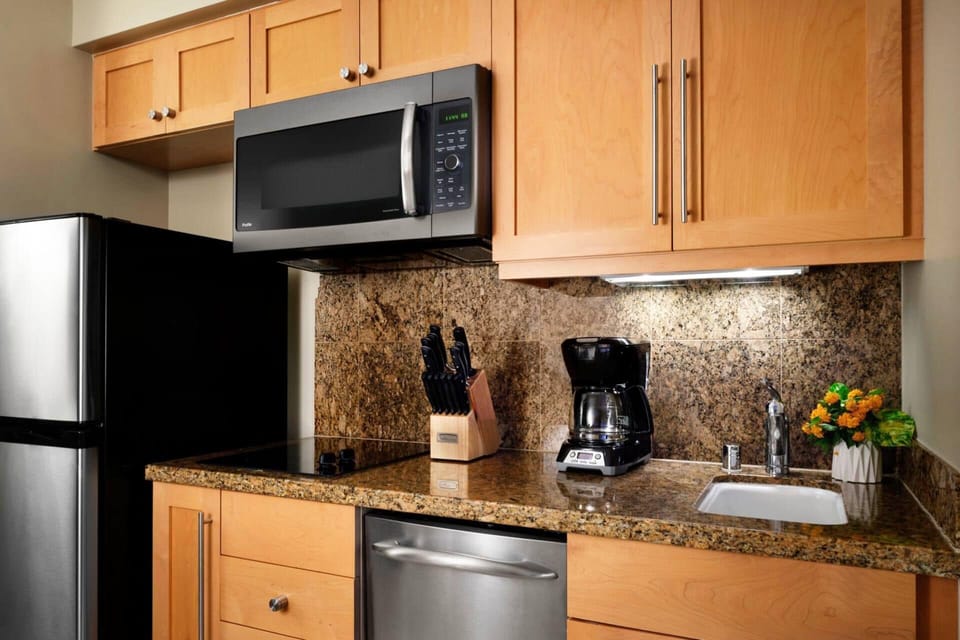 Kitchenette available in guest bedroom.