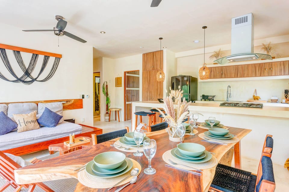 A wood dining table accommodates 6 for a nice sit-down meal