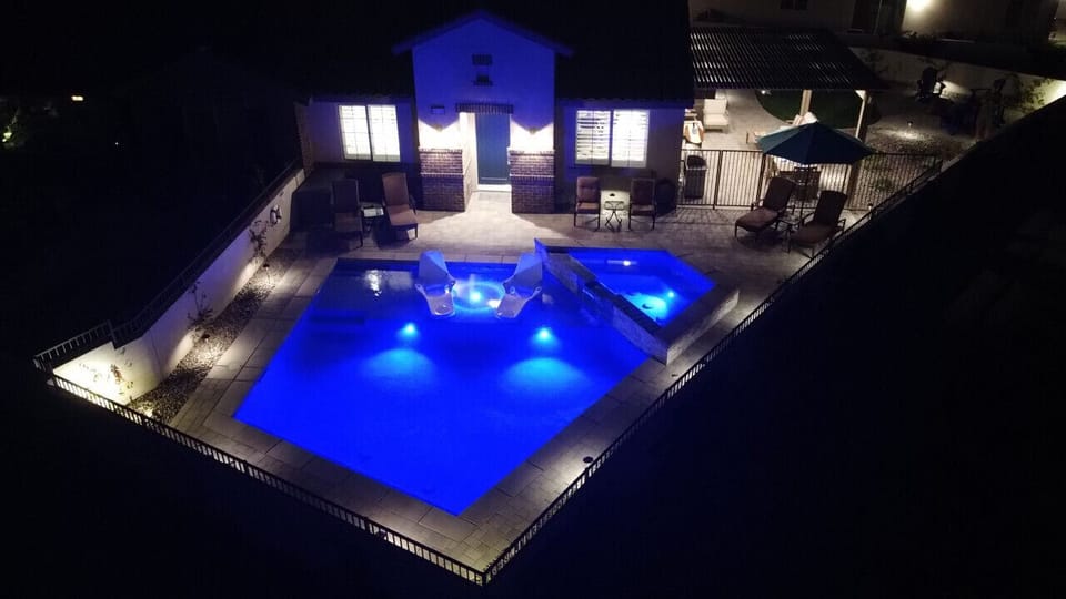 See the pool sparkle at night from this stunning aerial view.