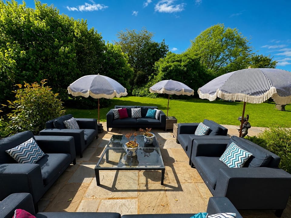 Terrace 2: Blue sofa and dining table for 12 westerly terrace 