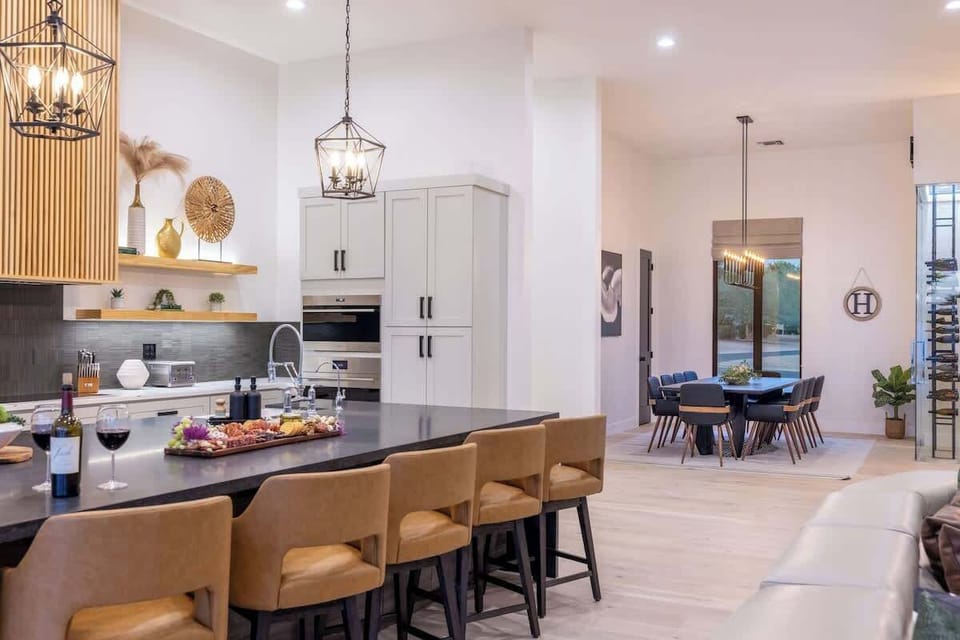 Gourmet kitchen with top-of-the-line appliances and stylish finishes.
