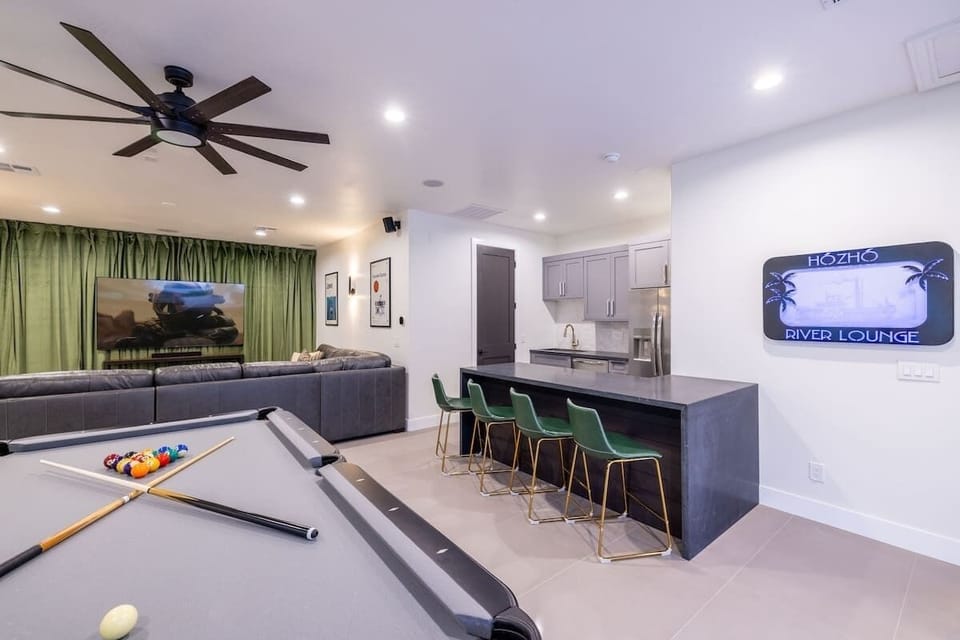 Game room fun with billiards, a bar, and ample space to unwind.