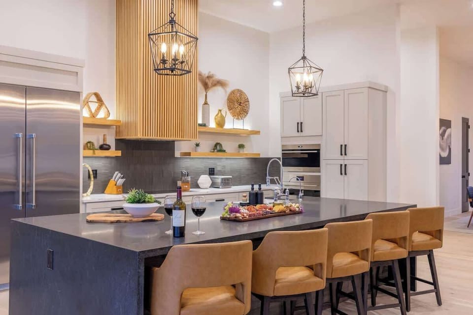 Spacious kitchen and living area designed for hosting and relaxation.