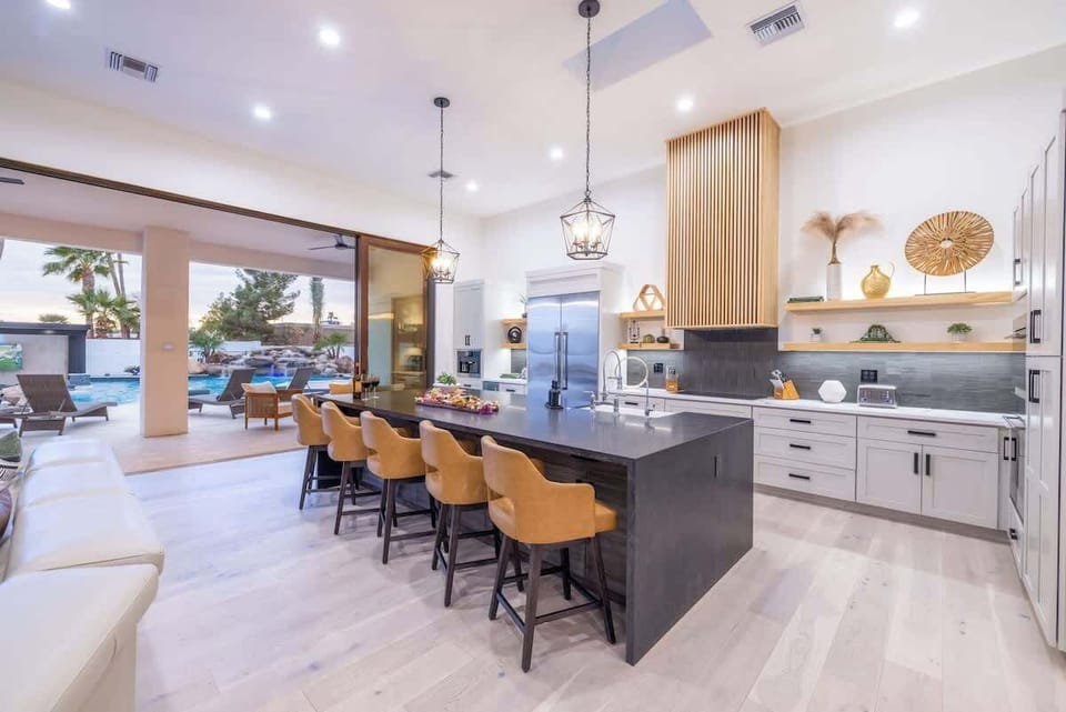Open-concept dining area with chic design and natural light pouring in.