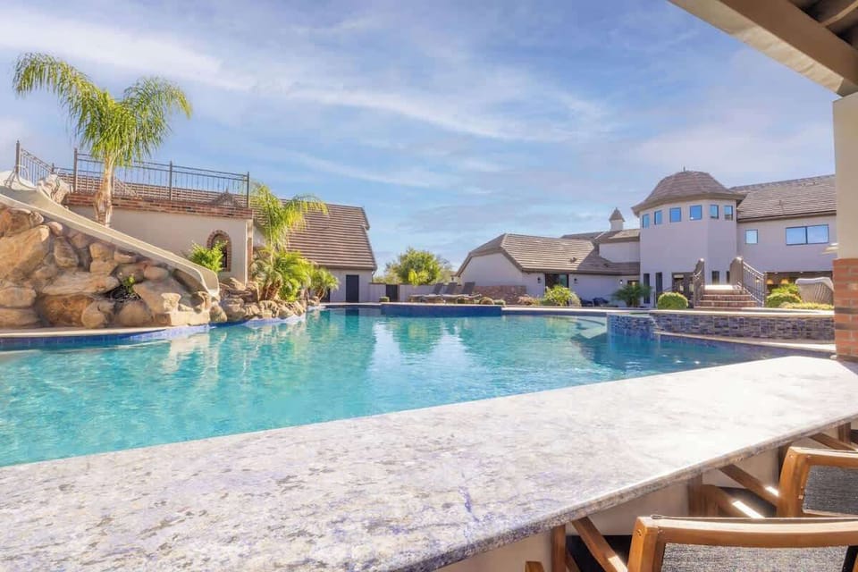 Swim-up bar with panoramic views of the sparkling pool—ideal for cocktails and conversation.