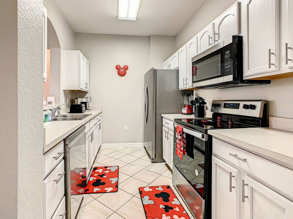 The kitchen is fully stocked with cooking essentials, making it easy to prepare delicious meals during your stay.