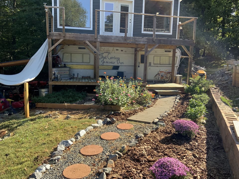 Tiny home lower unit.  Enjoy koi fish pond with relaxing babbling water fall!