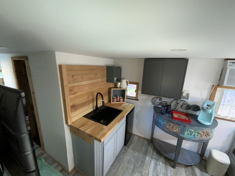 Tiny home tiny cooking!  Mini fridge Keurig coffee maker toaster oven.