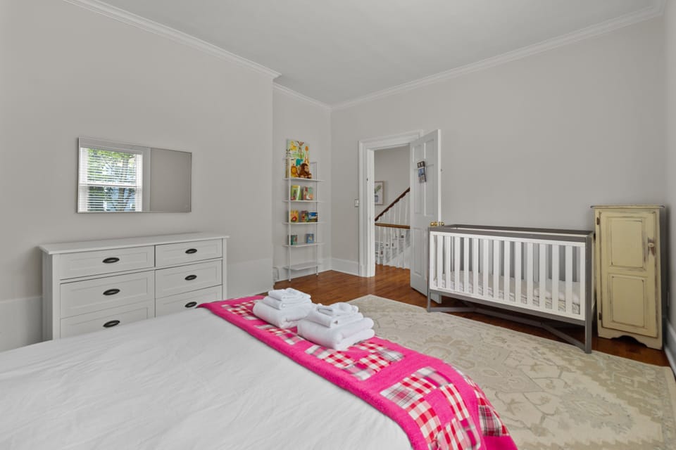 Exploring the enchantment from a new perspective in our kids' bedroom. Crib ready and vibrant colors create a haven for little ones to dream and play. 
