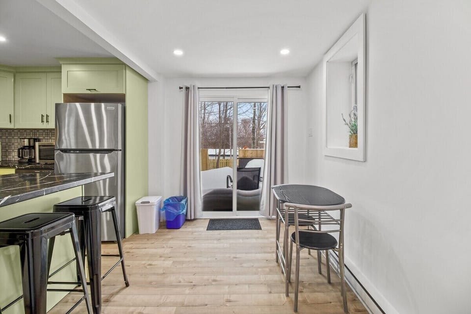 From breakfast to dinner, our stylish kitchen and dining space has everything you need!  Step outside to our inviting outdoor patio.