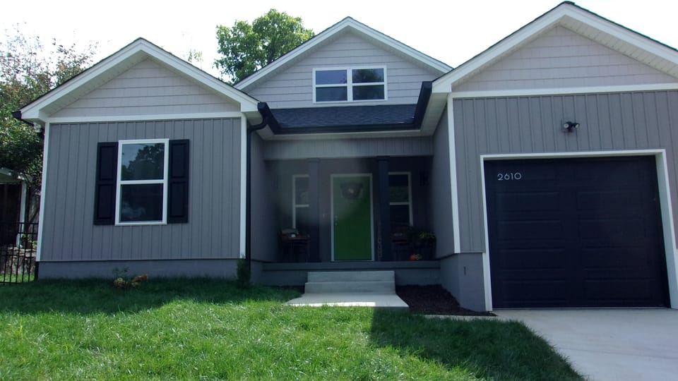 Front of House. The garage is 20' long with a 110 outlet to charge an Elec car.