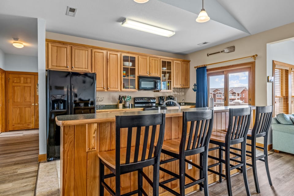 Spacious kitchen, fully stocked with utensils and kitchenware
