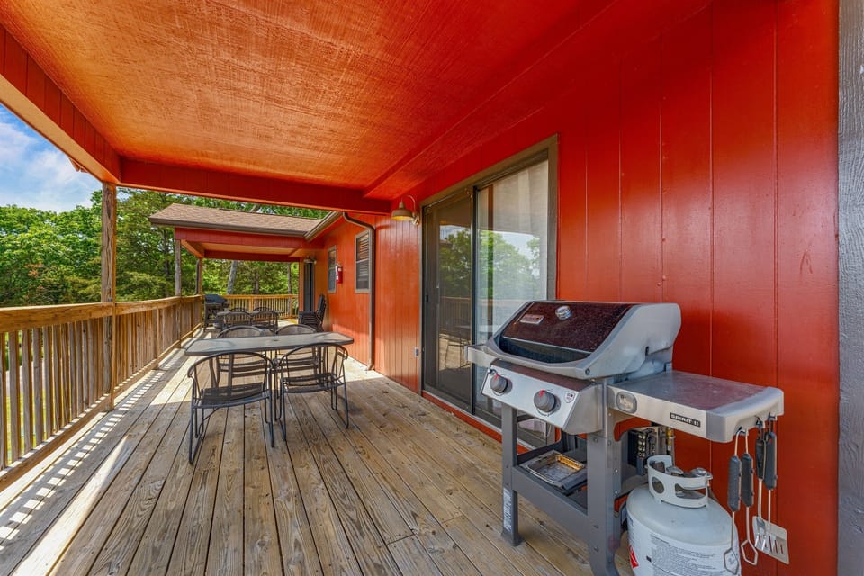 Deck with outdoor grill, perfect for sipping drinks, soaking up the scenery, and savoring every moment