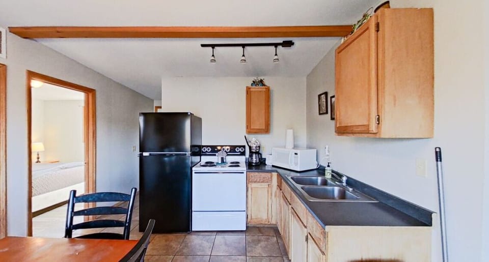 Where gourmet meals meet a kitchen and dining space designed for both cooking and sharing memories