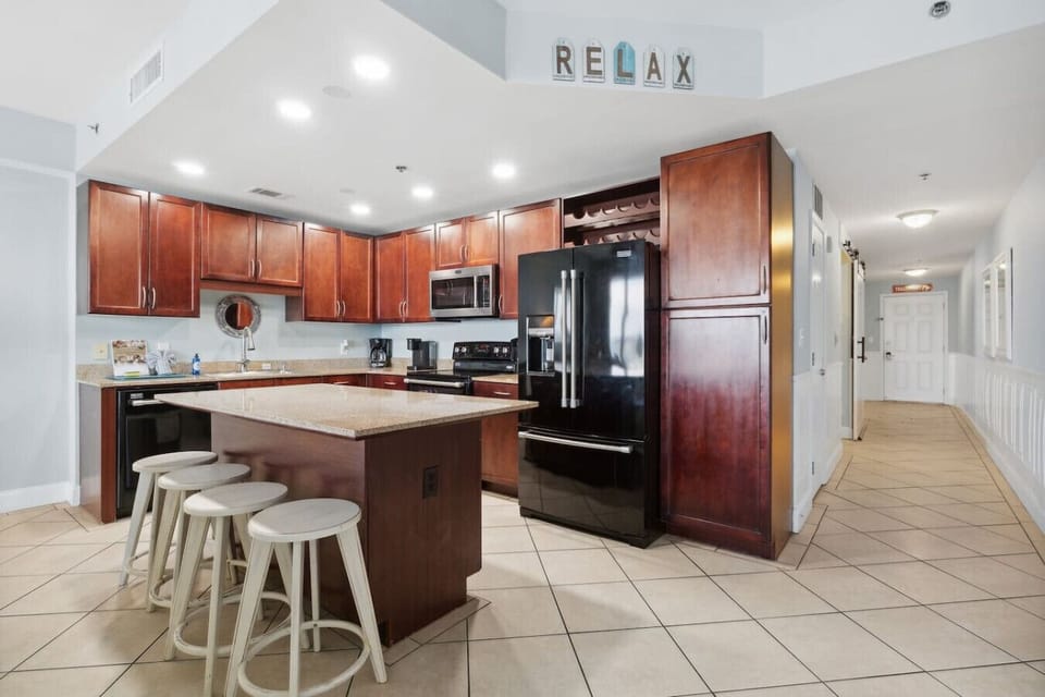 Fully Stocked Kitchen with Gulf Views and Island Bar Seating