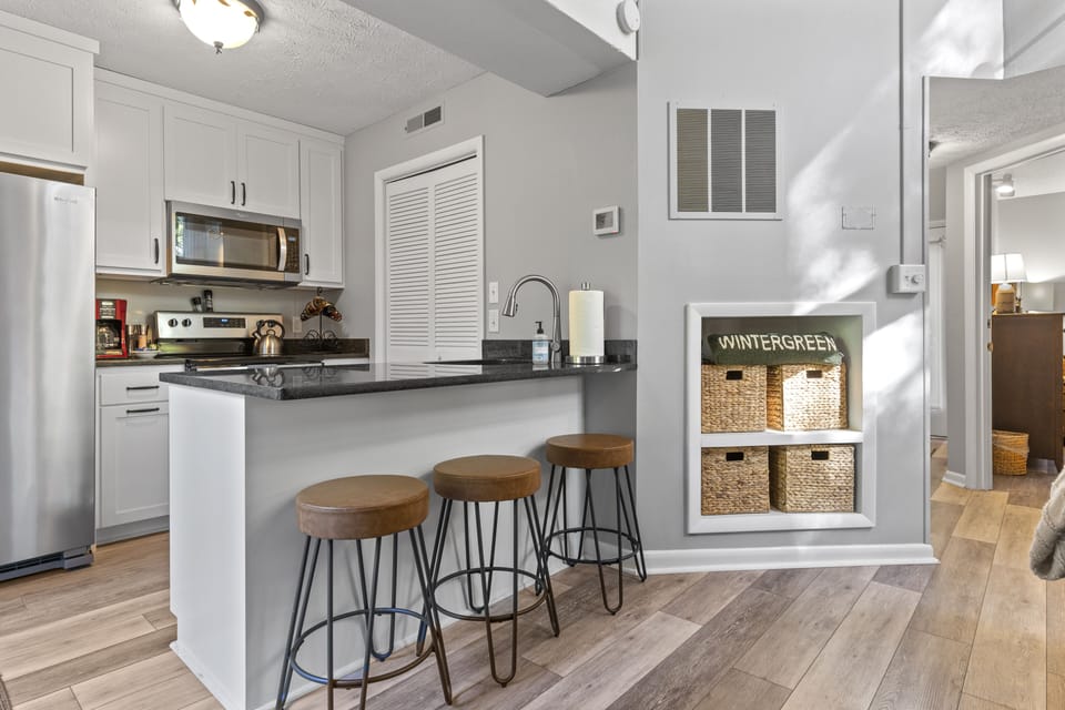 Guests enjoy gathering at the bar top on our comfy and stylish bar stools.