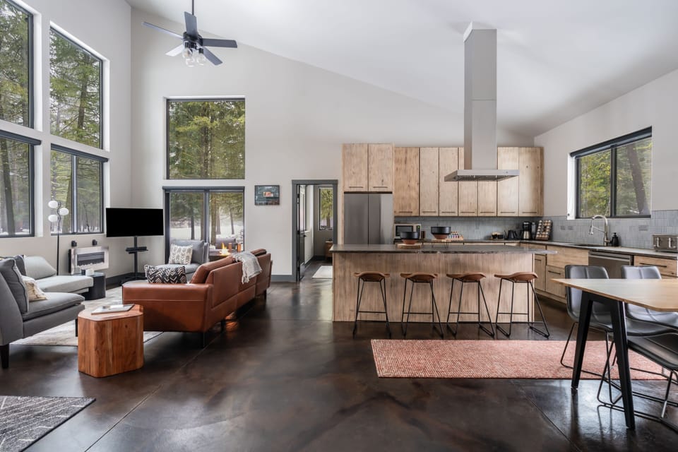 Open floor plan, natural light, rust acid-stained distressed floors